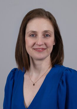 Christin Schmidt PhD Neuroscience wearing a blue dress