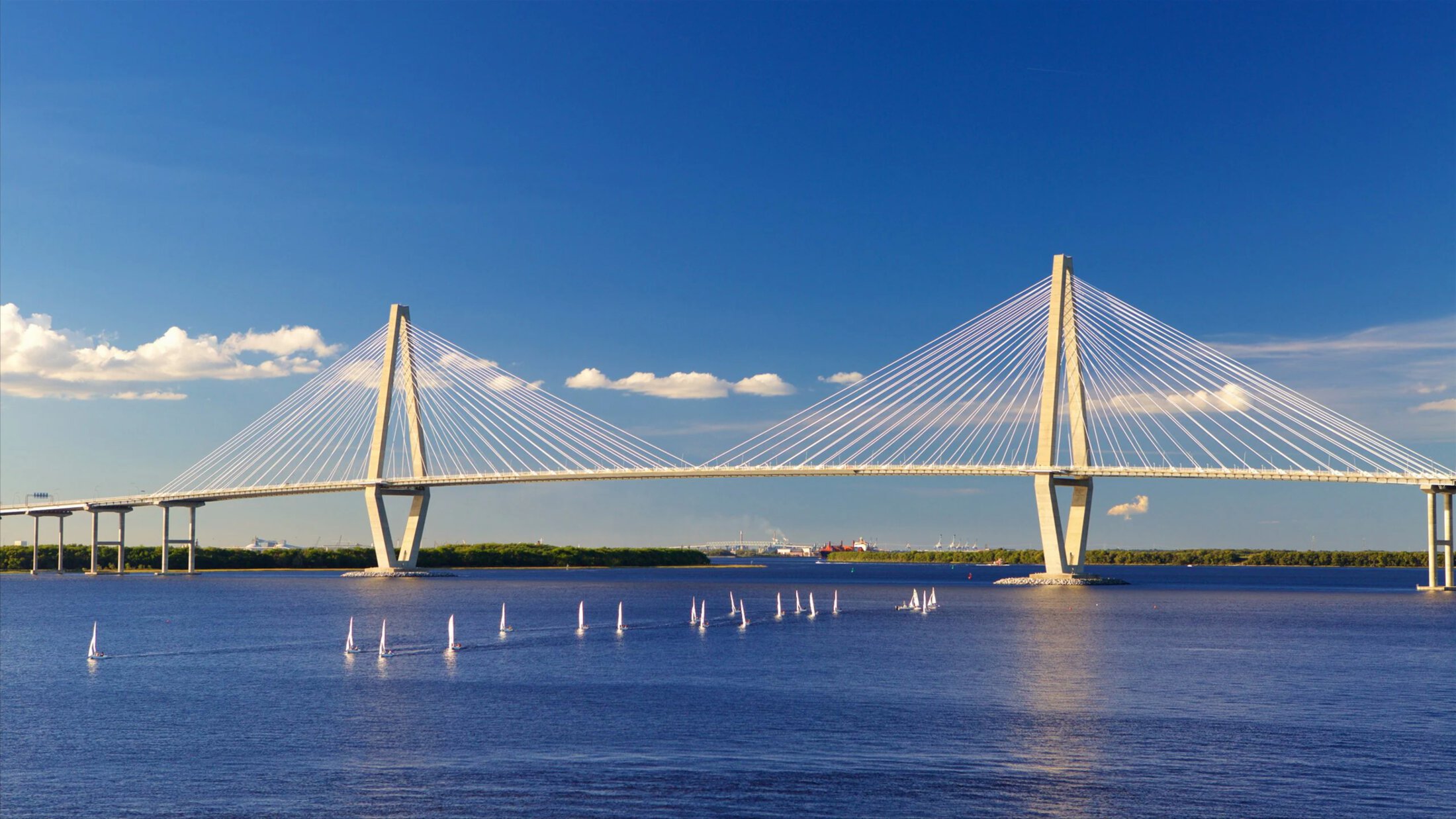 Ravenel Bridge sailboats and blue sky