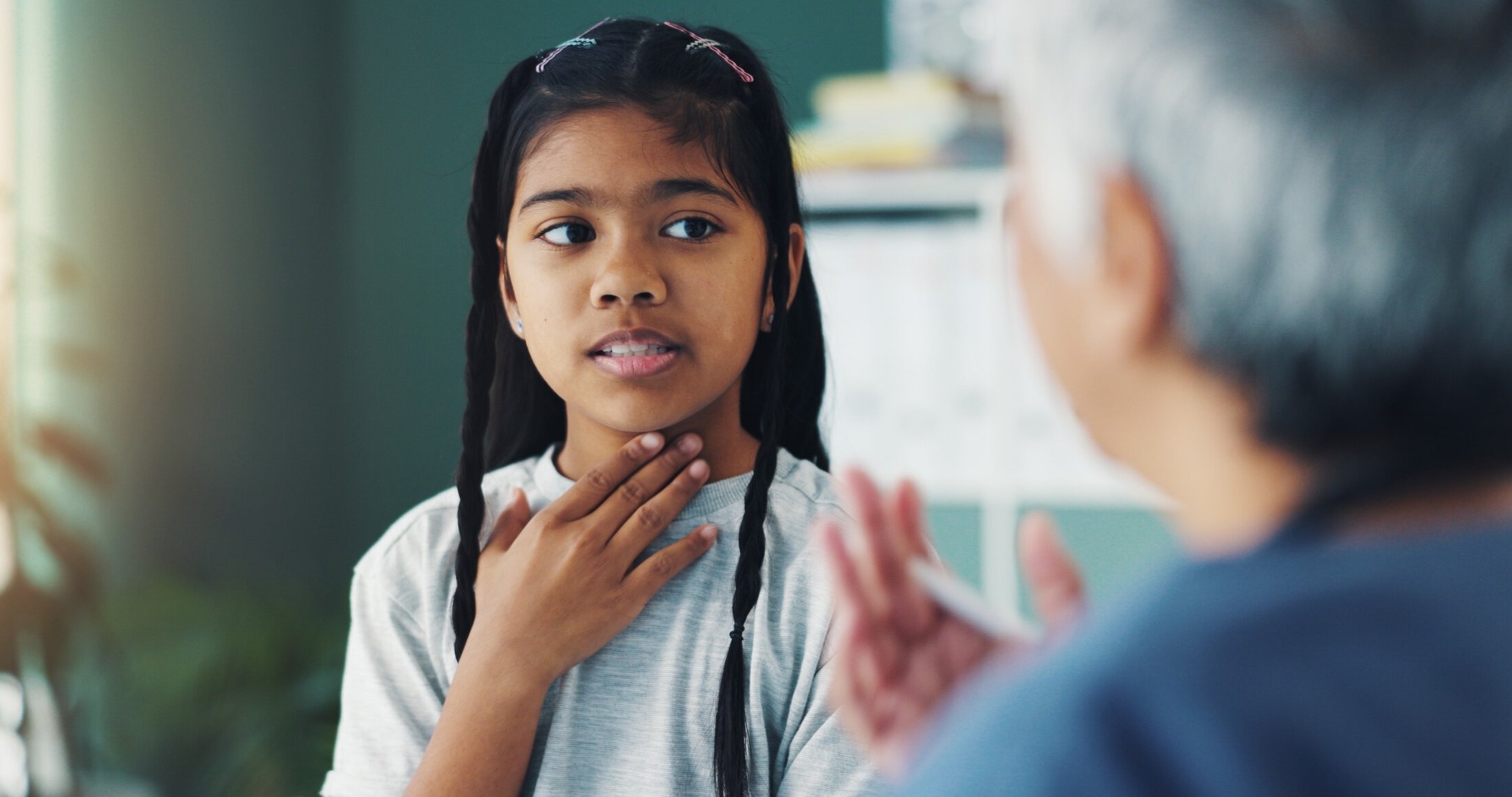 MUSC Health Childrens iIn Patient Rehab Child, girl and doctor in office for consultation, speech therapy or health treatment for sore throat. Healthcare, pediatrician and sick kid in clinic for advice, professional help or medical checkup.
