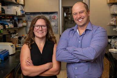 Aaron Hobbs with Hollings Cancer Center colleague Burge